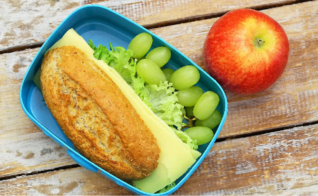 HEALTHY LUNCH BOX: A brown bread cheese sandwich, grapes and apple ticks all the boxes. HEALTHY LUNCH BOX: A brown bread cheese sandwich, grapes and apple ticks all the boxes.
